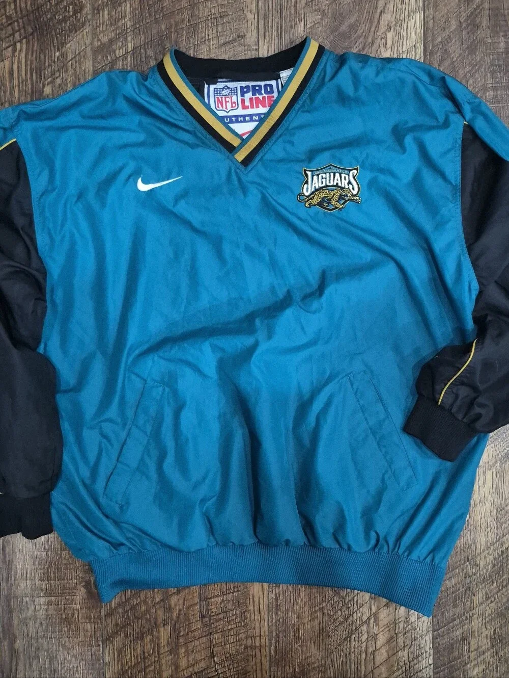 Vintage 90's Nike NFL Pro Line Jacksonville Jaguars V Neck Windbreaker Size XL